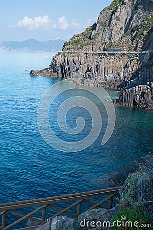 Top view of the stunning color of the sea, the mountains and the road of love. View from the coast of Riomaggiore. Cinque Terre. Stock Photo