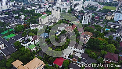 Top View of Suburban Neighborhood in Bangkok. Aerial view of parking and roof tops of Thailand housing development. Top Editorial Stock Photo