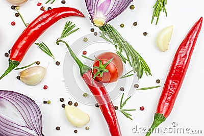 Top view of summer vegetables: onion, garlic, tomato, red pepper, rosemary and peppercorns on white table background. Stock Photo