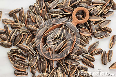 Top View Sunflower Seed on Wooden Spoon Stock Photo