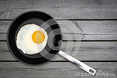 Fried egg in a pan Stock Photo
