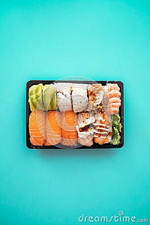 Top view of take away sushi package isolated on coloful background Stock Photo