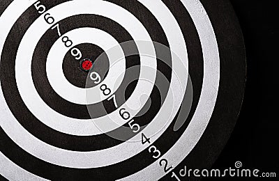 Top view of the target dartboard on dark background, business marketing, success, growth up and winner concept Stock Photo