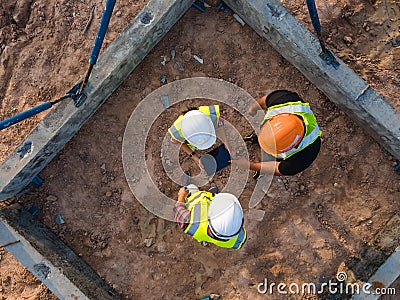 Top view team engineer working in construction site Editorial Stock Photo