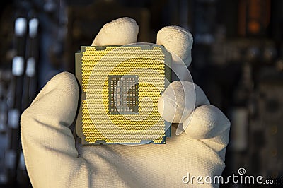 Top view of technician installing CPU chip on motherboard, CPU chip It& x27;s the brain part of the computer Stock Photo