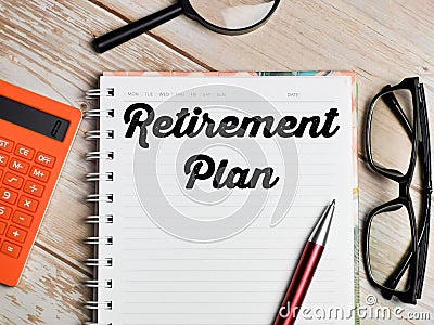 Top view text Retirement Plan written on note book Stock Photo