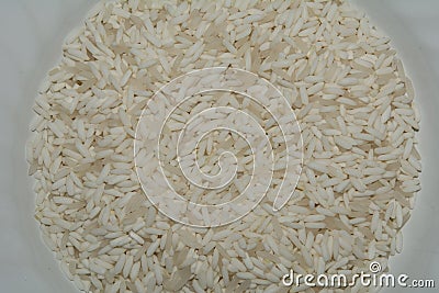 Top view texture of rice in dish, Macro image Stock Photo