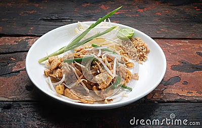 Top view Thai food Pad Thai chicken on rustic wooden table Stock Photo