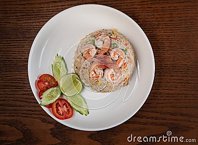 Top view Thai food shrimp fried rice on wooden table Stock Photo