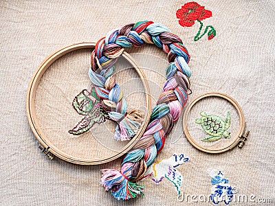 Top view of threads woven into braid and hoops Stock Photo