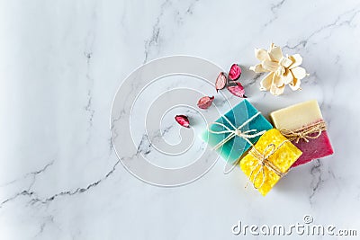 Top view of three organic handmade soap bars. White marble background. Natural cosmetic Stock Photo