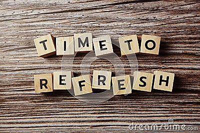 Time To Refresh alphabet letter on wooden background Stock Photo