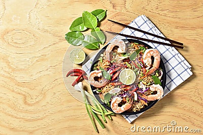 Top view Tom Yum Kung Noodle Spicy Fried Dried,Fried dried shrimp noodle,Thai food,Spicy Food. Stock Photo