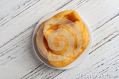 Top view traditonal Chinese friedcake on white wood Stock Photo