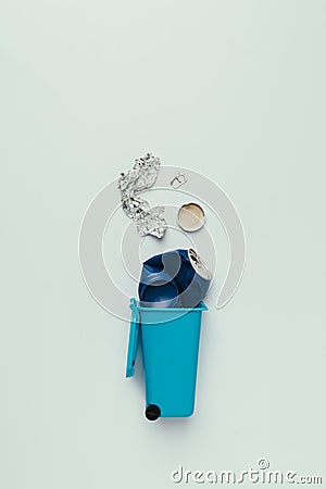 top view of trash bin with assorted garbage isolated on grey, recycling concept Stock Photo