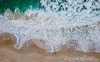 Top view at a tropical beach with waves and blue ocean Drone aerial view at Freedom beach in Phuket Stock Photo