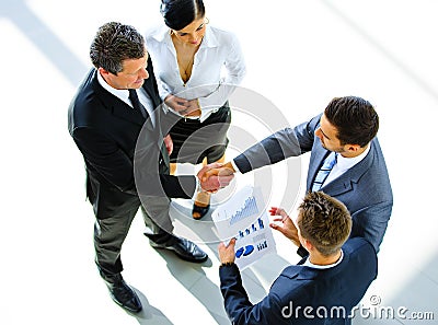 Top view of a two businessman shaking hands Stock Photo