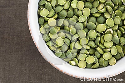 Uncooked Green Split Peas in a Bowl Stock Photo