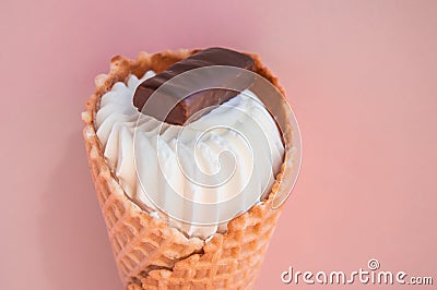 Top view vanilla ice cream cone scoop with chocolate chip cookies on pink background, copy space Stock Photo