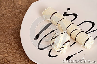 Top view vanilla ice cream crepe with chocolate sauce Stock Photo