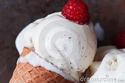 Top view vanilla ice cream in waffle cone with mint leaves on a Stock Photo