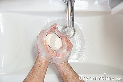 Top view washing of male hands soap foam water Stock Photo
