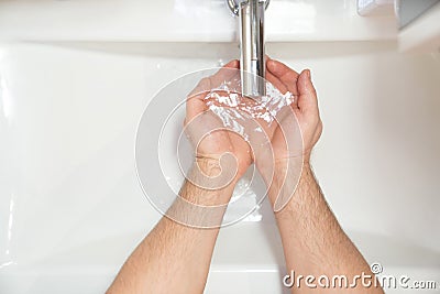 Top view washing of men hands soap foam and water Stock Photo