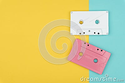 Top view of the white and pink audio cassette tapes Stock Photo