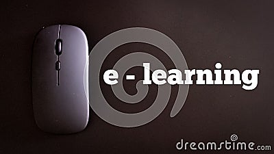 Top view wireless mouse with text e learning isolated on black background Stock Photo