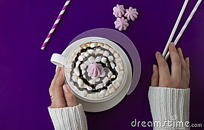 Top view of woman hand holding a cup of coffee over flatlay Stock Photo