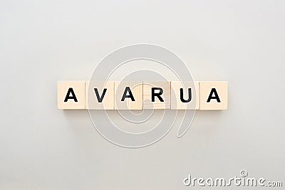 Top view of wooden blocks with Avarua lettering on grey background. Stock Photo