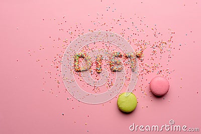 Top view of word diet made from candies isolated on pink Stock Photo