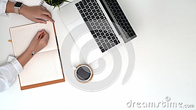 Top view working woman writing notes Stock Photo