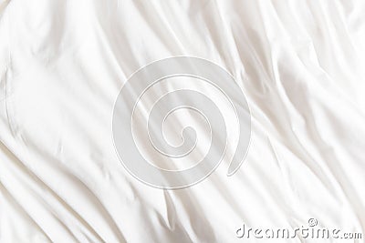 Top view of wrinkles on an unmade bed sheet. Stock Photo