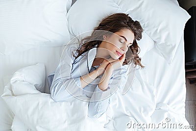 Top view of young beautiful woman in pajamas sleeping peacefully Stock Photo