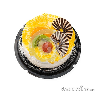 Top view yummy cake on white with grape orange kiwifruit and chocolate on top Stock Photo