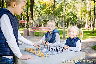 The topic children learning, logical development, mind and math, miscalculation moves advance. large family brothers and sister Stock Photo