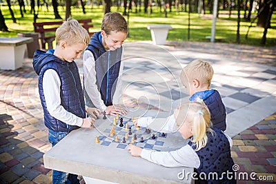The topic children learning, logical development, mind and math, miscalculation moves advance. large family brothers and sister Stock Photo