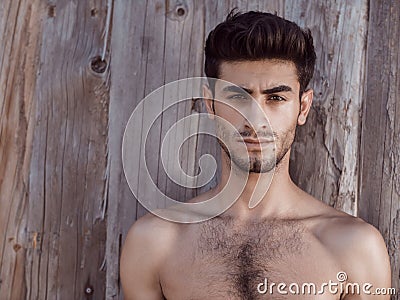 Handsome topless young man outdoors Stock Photo