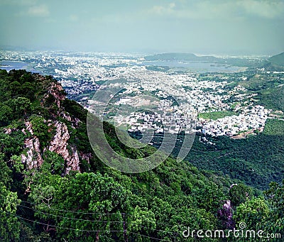 Topmost high altitude view of lakes and mountain city, Udaipur India. Royality with culture Stock Photo