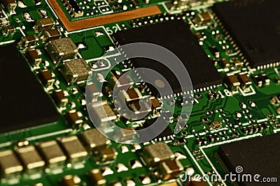 Topology of the smartphone motherboard under the metal shields of the modules Stock Photo