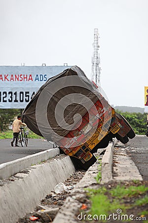 Toppled Indian Truck Editorial Stock Photo