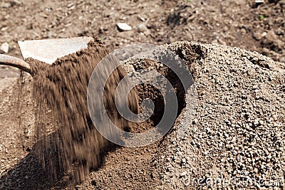 Topsoil being turned with a spade Stock Photo