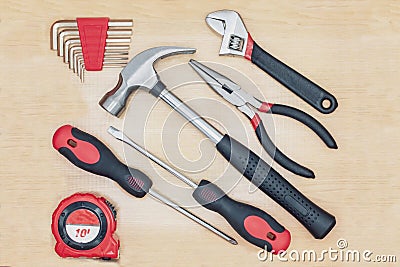 Topview of household hand tools on woodgrain background Stock Photo