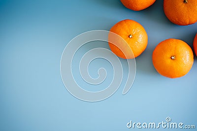 Topview of orange with desktop on plates blue background. topview or flat lay fruit. Stock Photo