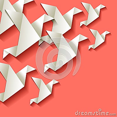 Origami paper birds white in the corner on a Coral color background Stock Photo