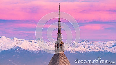 Torino Turin, Italy: cityscape at sunrise with details of the Mole Antonelliana towering over the city. Scenic colorful light on Stock Photo