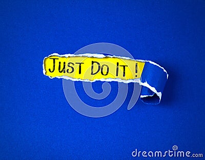 Torn blue Paper and space for Just Do it message text with yellow paper background , motivate and cheering concept Stock Photo