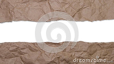 Torn, crumpled brown wrapping paper revealing white copy space in center gap. Stock Photo