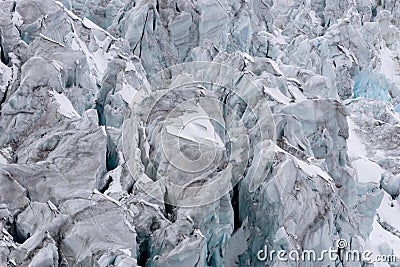 Torn glacier with many crevasses in detail Stock Photo